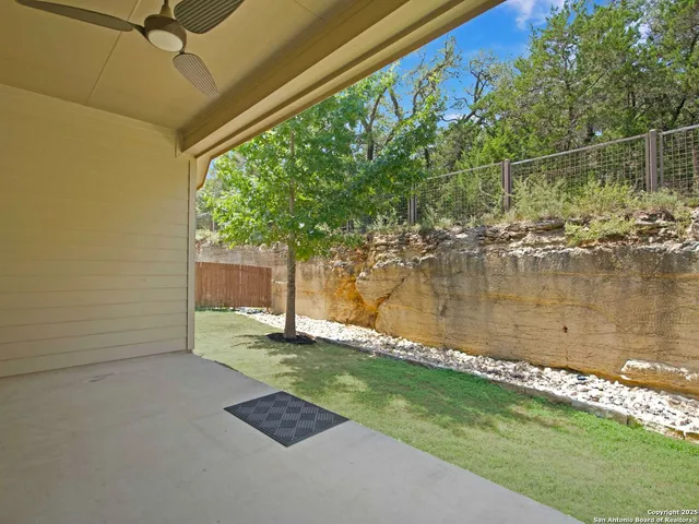 a view of a yard with a fountain