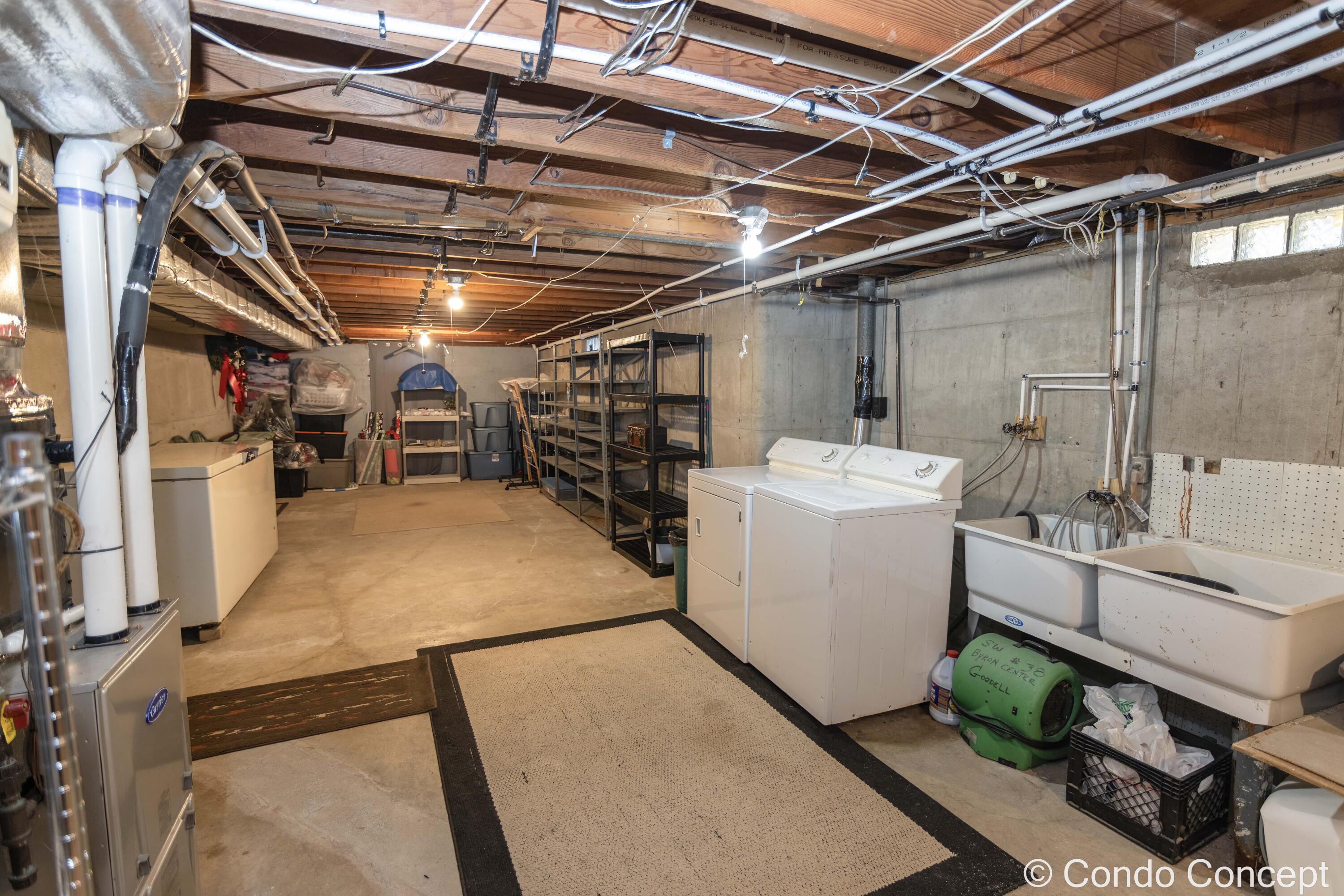 8441 Homerich Avenue Southwest Byron Center, MI 49315 - Photo 35 of 54 Laundry/Storage