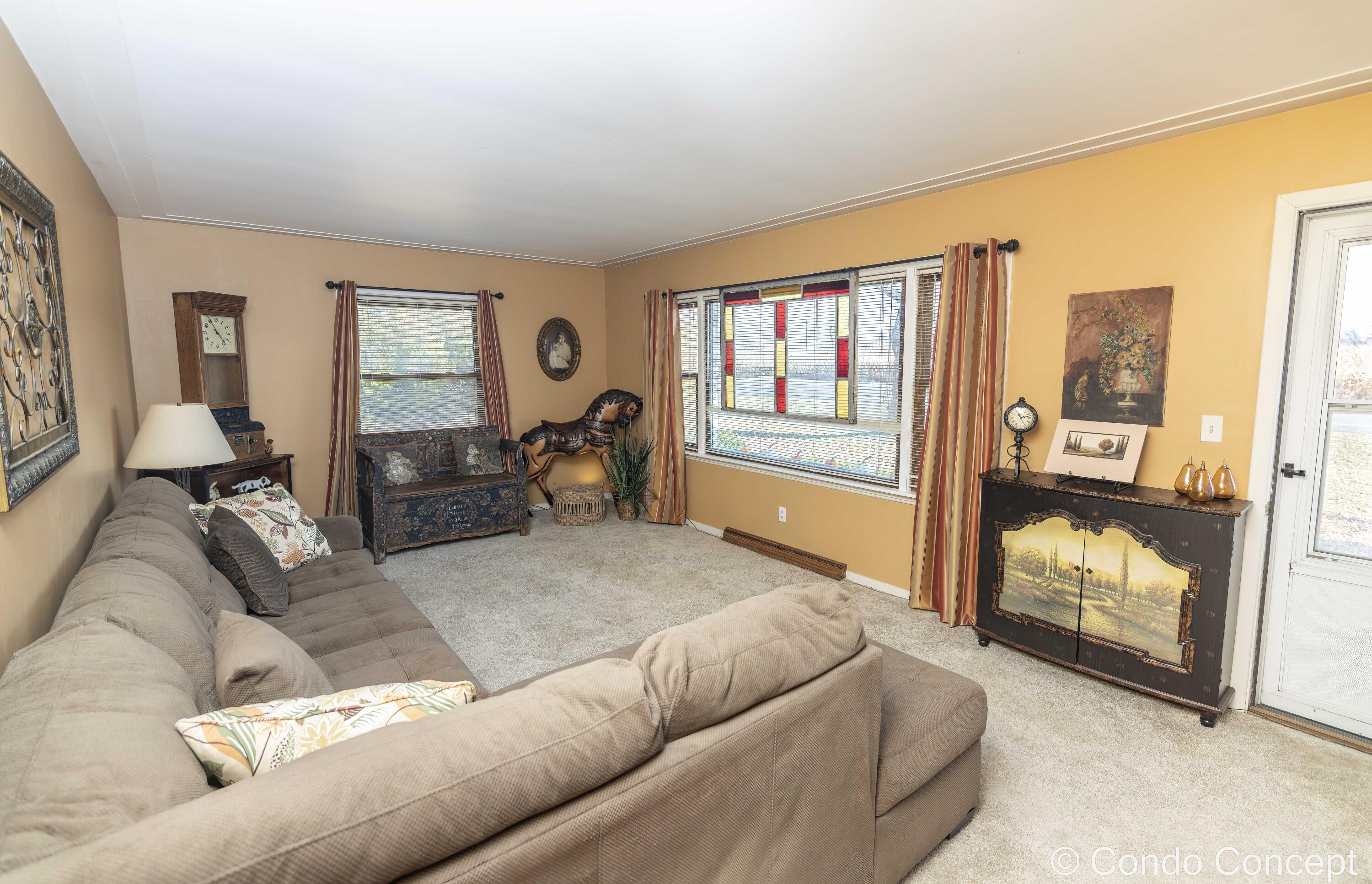 8441 Homerich Avenue Southwest Byron Center, MI 49315 - Photo 9 of 54 Front Living Area