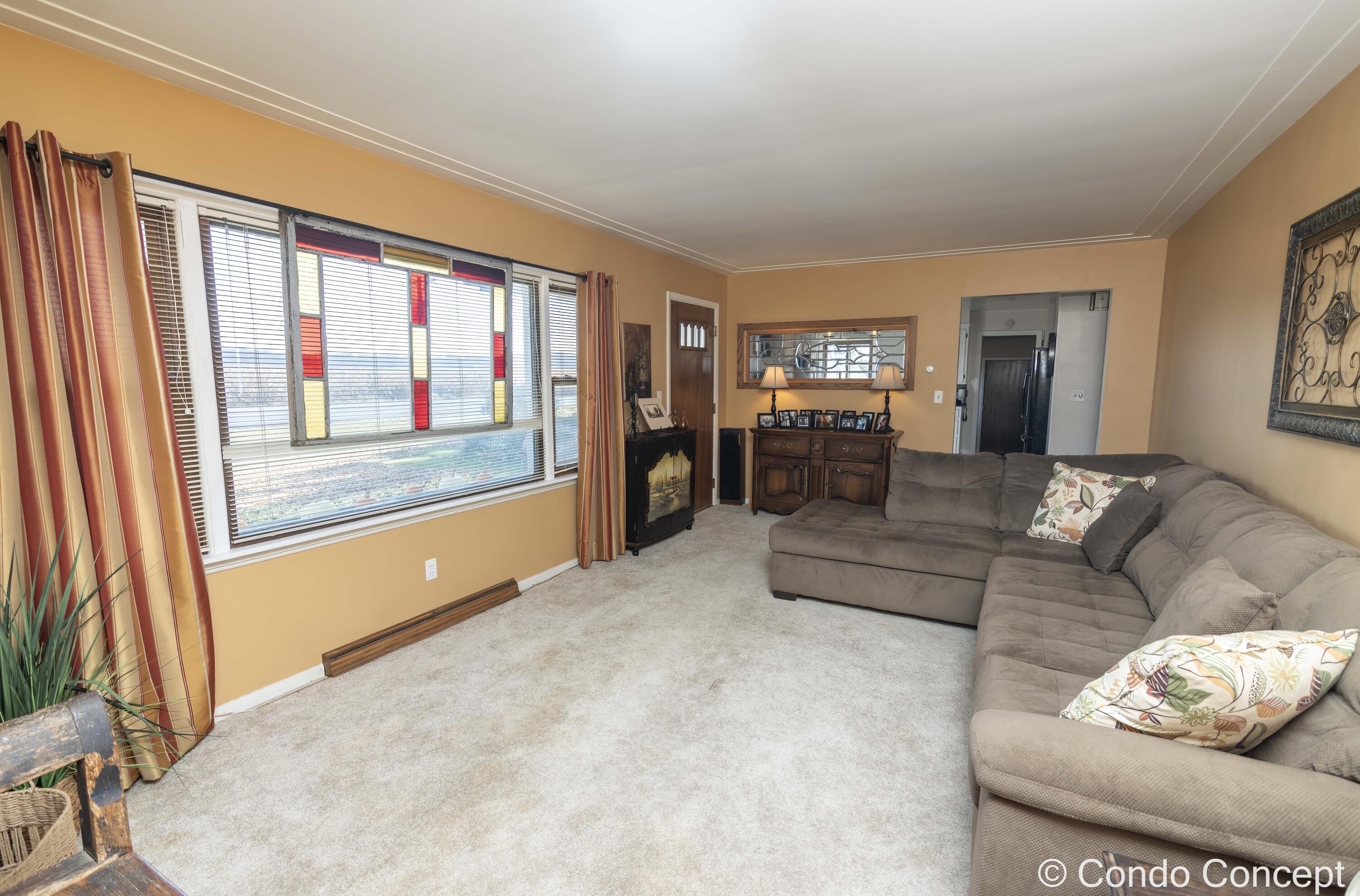 8441 Homerich Avenue Southwest Byron Center, MI 49315 - Photo 10 of 54 Front Living Area1