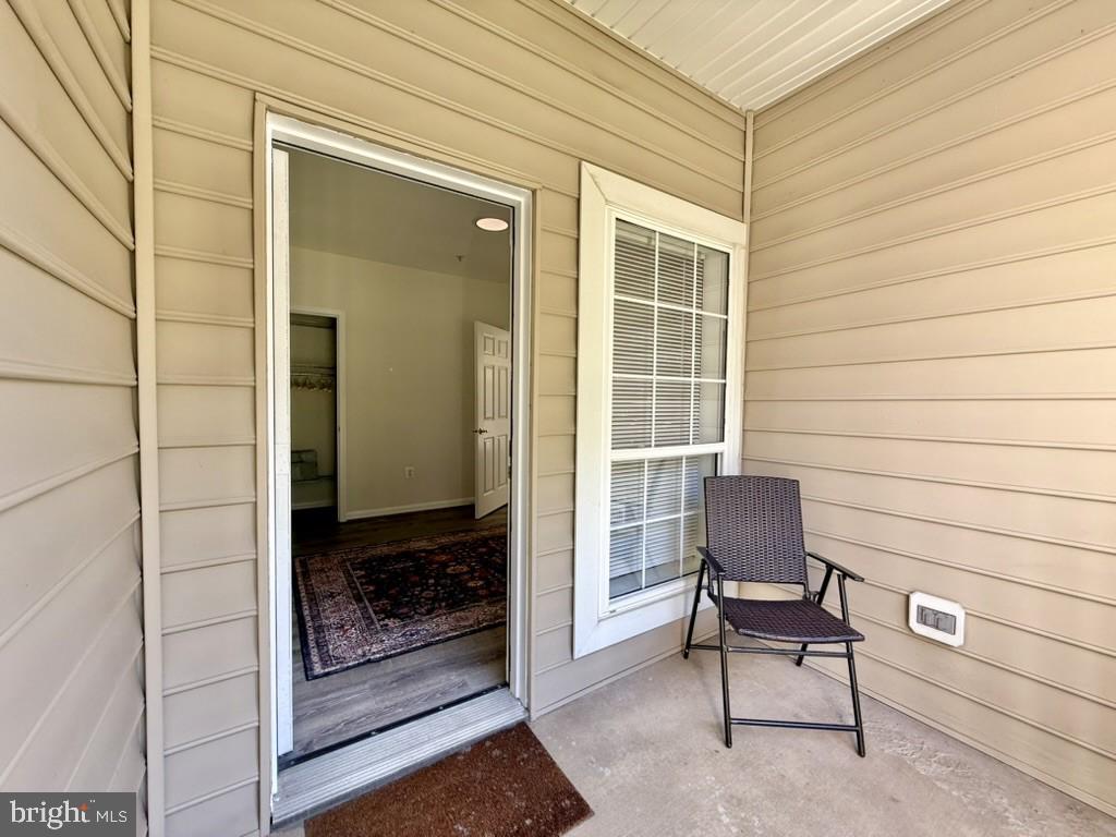 4561 Strutfield Lane, Unit 3115 Alexandria, VA 22311 - Photo 23 of 36 a view of chair in the room with a door
