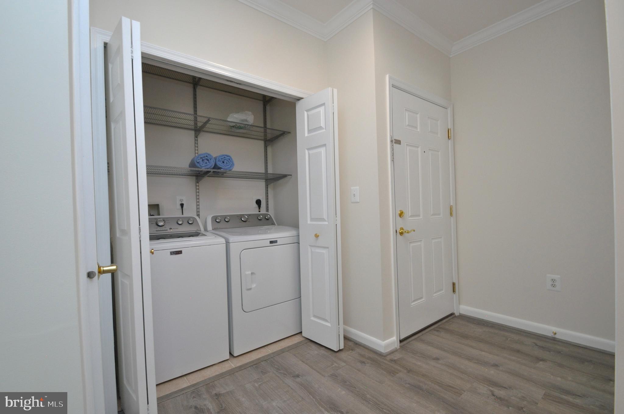 4561 Strutfield Lane, Unit 3115 Alexandria, VA 22311 - Photo 3 of 36 a room with storage and utility