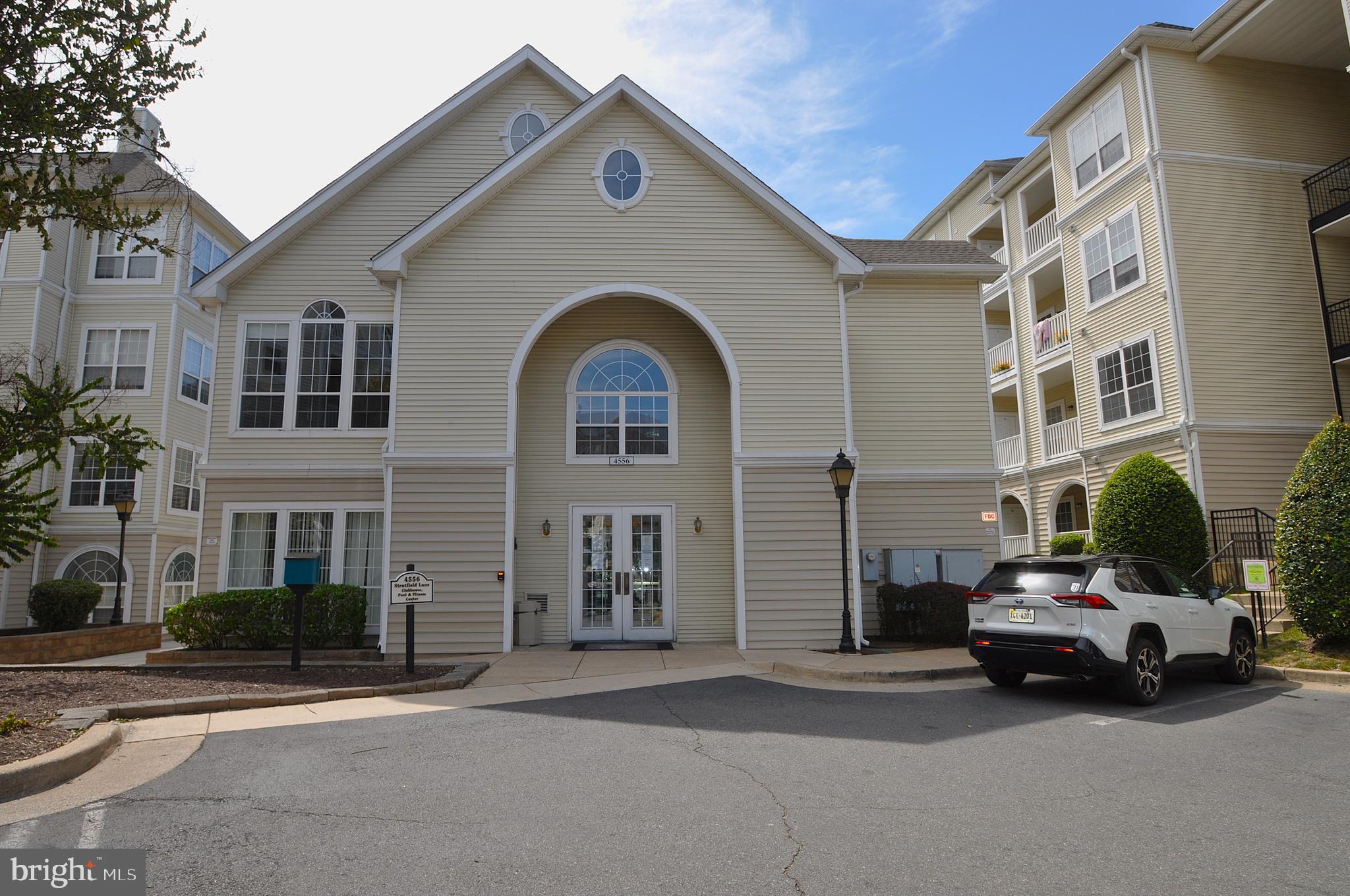 4561 Strutfield Lane, Unit 3115 Alexandria, VA 22311 - Photo 31 of 36 a view of a car parked in front of a building
