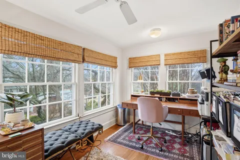a work room with large windows