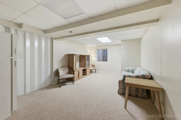 a bedroom with furniture and a bed