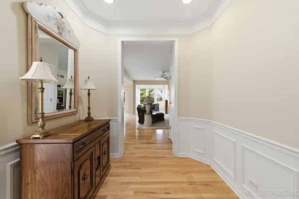 a view of a kitchen from the hallway