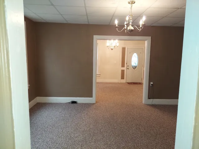 a view of a chandelier in a room