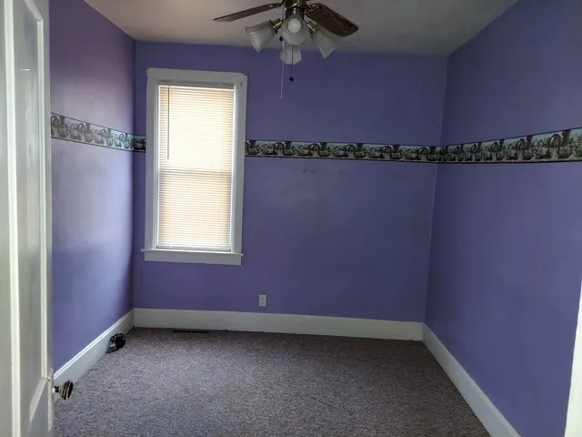 a view of a room with a window