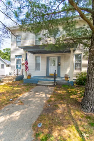 a view of a house with a ocean view