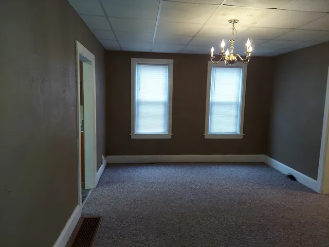 wooden floor and windows in an empty room