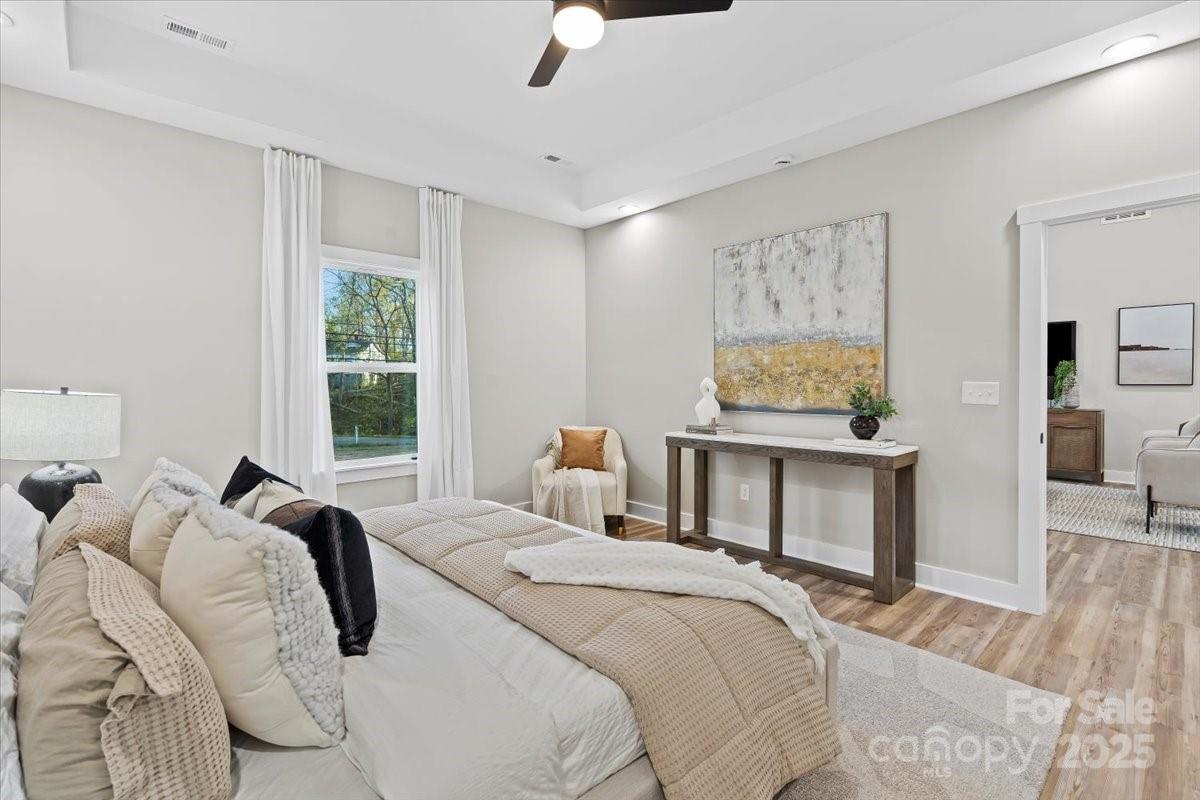 522 Waco Road Kings Mountain, NC 28086 - Photo 14 of 26 a bedroom with a bed and wooden floor