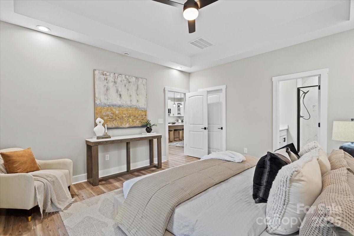 522 Waco Road Kings Mountain, NC 28086 - Photo 15 of 26 a bedroom with a bed and a couch