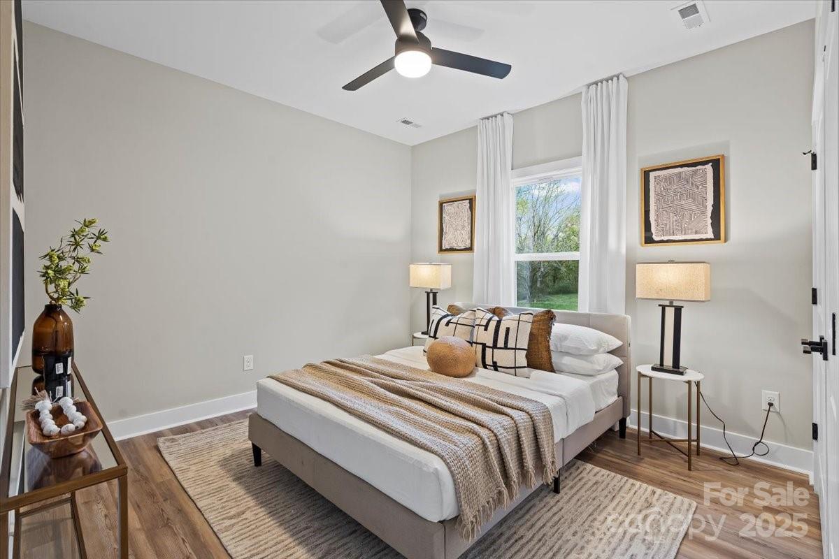 522 Waco Road Kings Mountain, NC 28086 - Photo 20 of 26 a bedroom with a bed and a lamp on the dresser