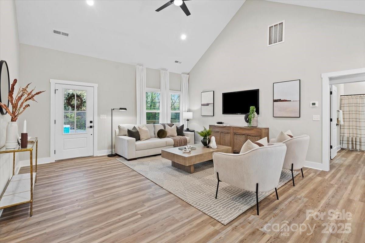 522 Waco Road Kings Mountain, NC 28086 - Photo 2 of 26 a living room with furniture and a flat screen tv