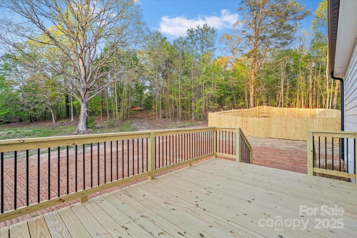 522 Waco Road Kings Mountain, NC 28086 - Photo 24 of 26 a balcony with trees in front of it
