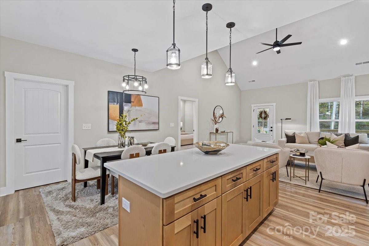 522 Waco Road Kings Mountain, NC 28086 - Photo 8 of 26 a view of a center island and chandelier