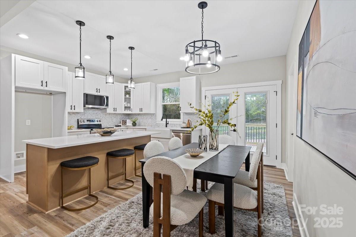 522 Waco Road Kings Mountain, NC 28086 - Photo 10 of 26 a view of a dining room and a kitchen island