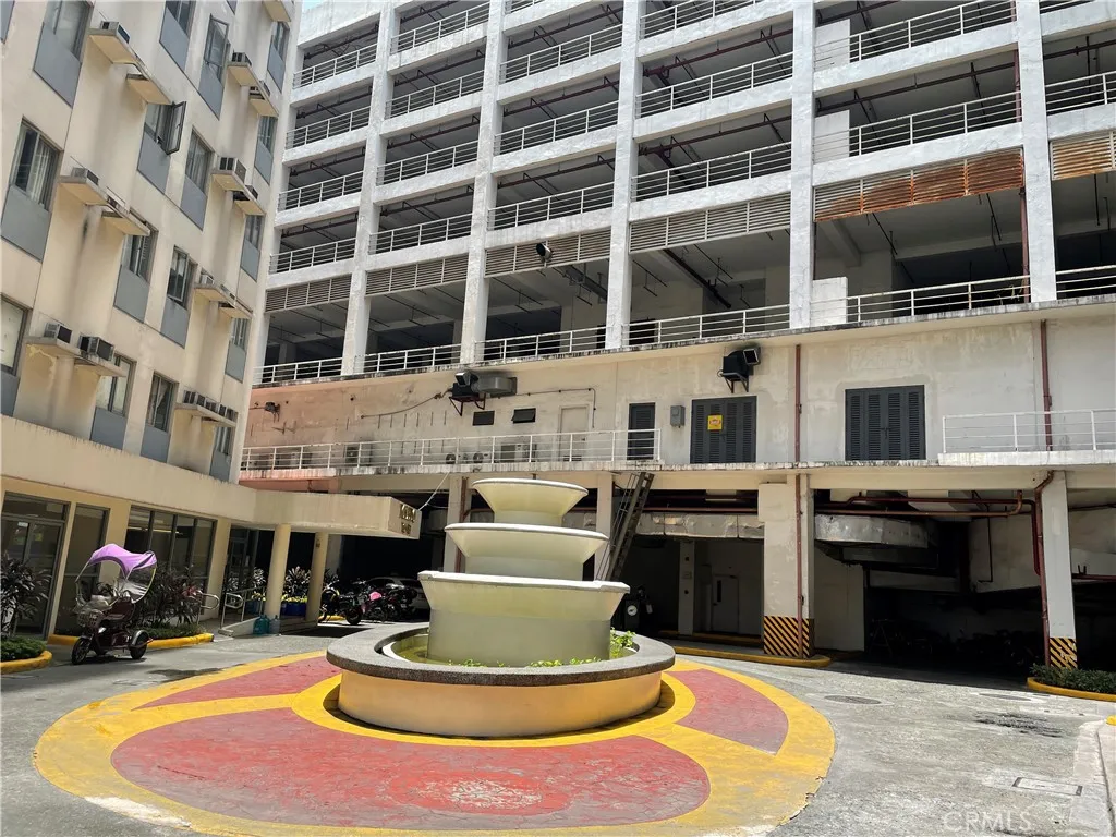 1201 Valderama Tower, Unit 325 Springtown, TX 76082 - Photo 3 of 16 a large building with a lot of windows