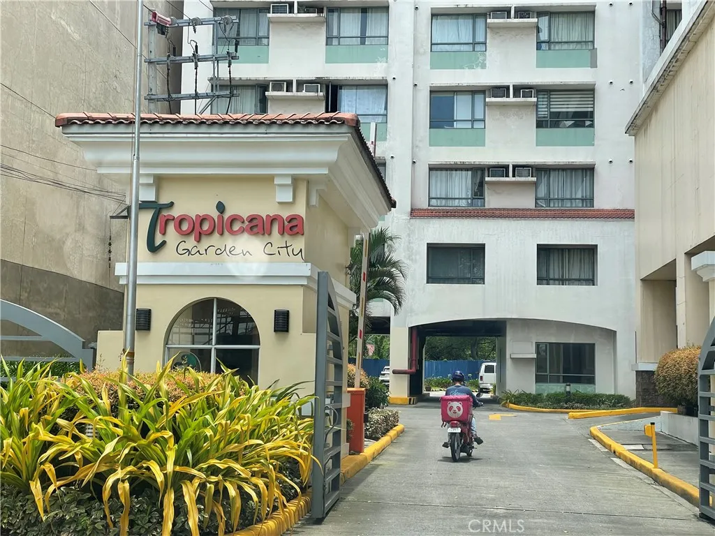1201 Valderama Tower, Unit 325 Springtown, TX 76082 - Photo 4 of 16 a view of building with an outdoor space