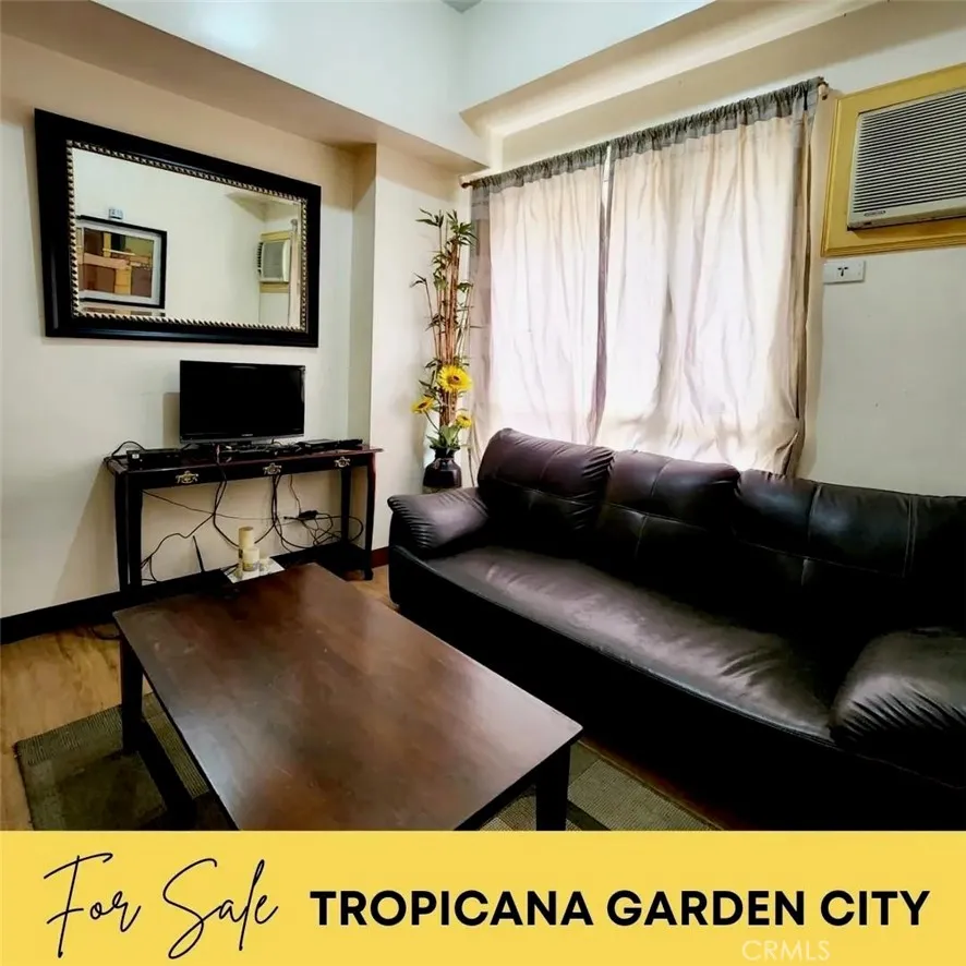 1201 Valderama Tower, Unit 325 Springtown, TX 76082 - Photo 7 of 16 a living room with a couch and a coffee table