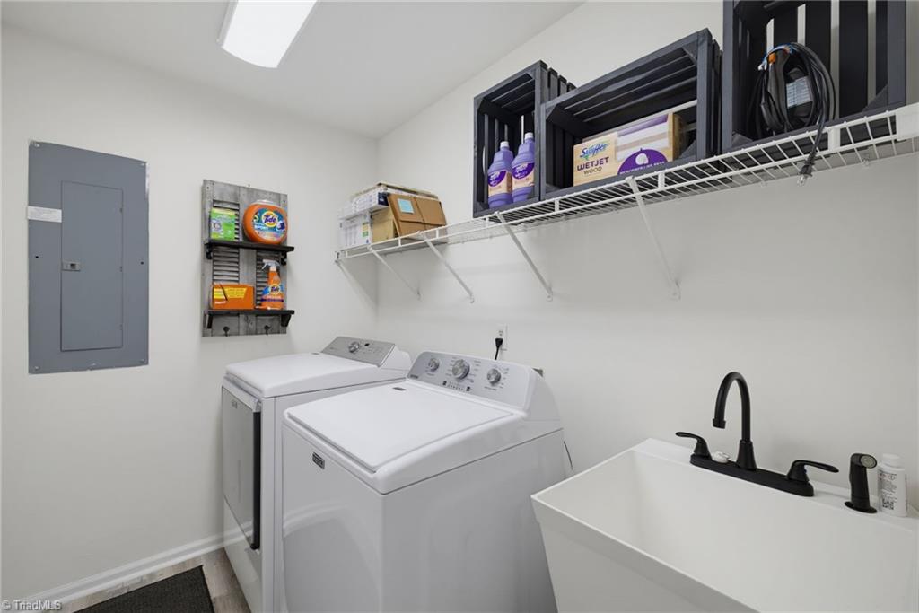 2800 Spencers Grove Road Browns Summit, NC 27214 - Photo 24 of 49 A spacious laundry room with sink.
