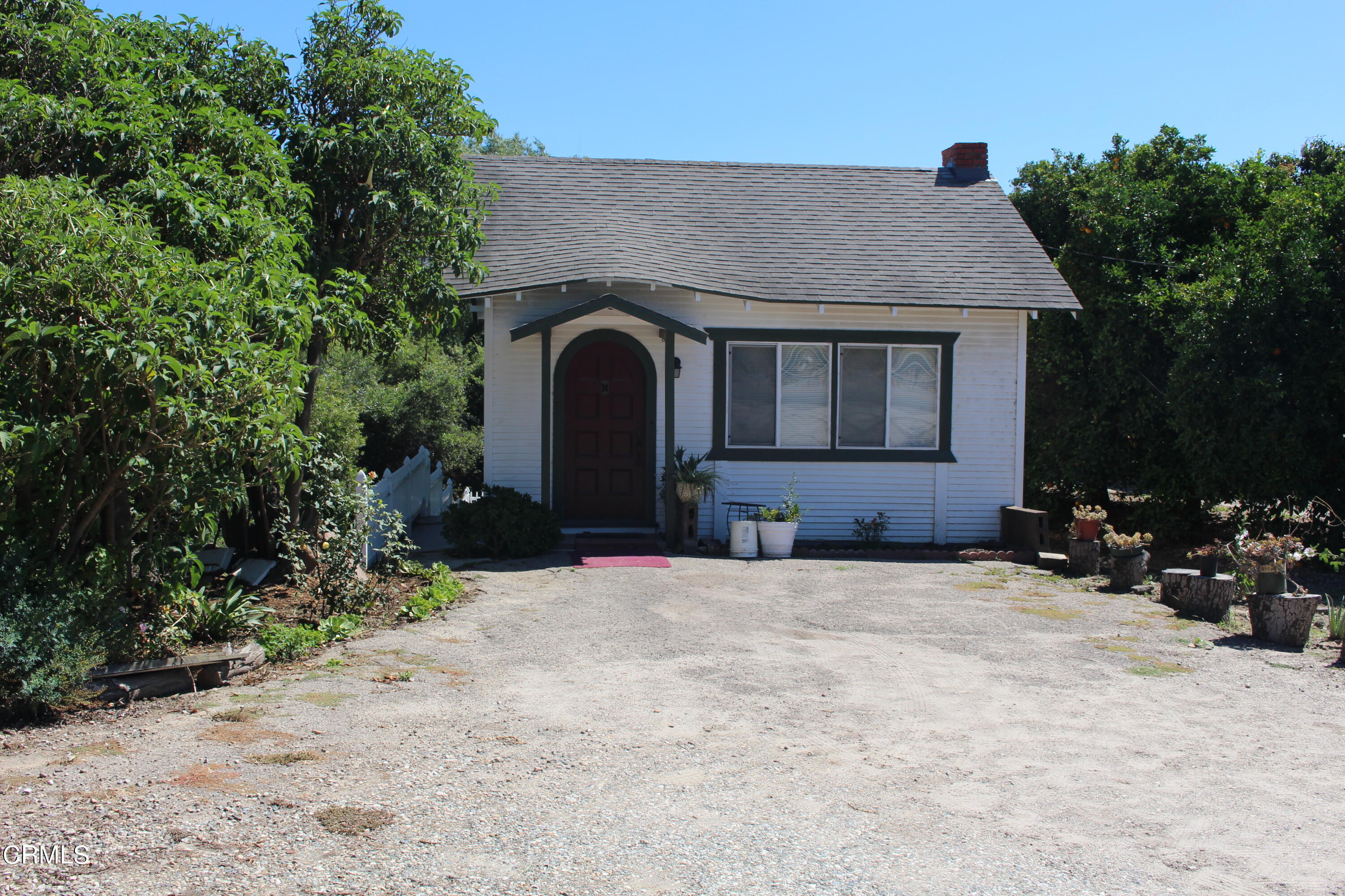 19086 East Telegraph Road Santa Paula, CA 93060 - Photo 11 of 26 a front view of a house with a yard