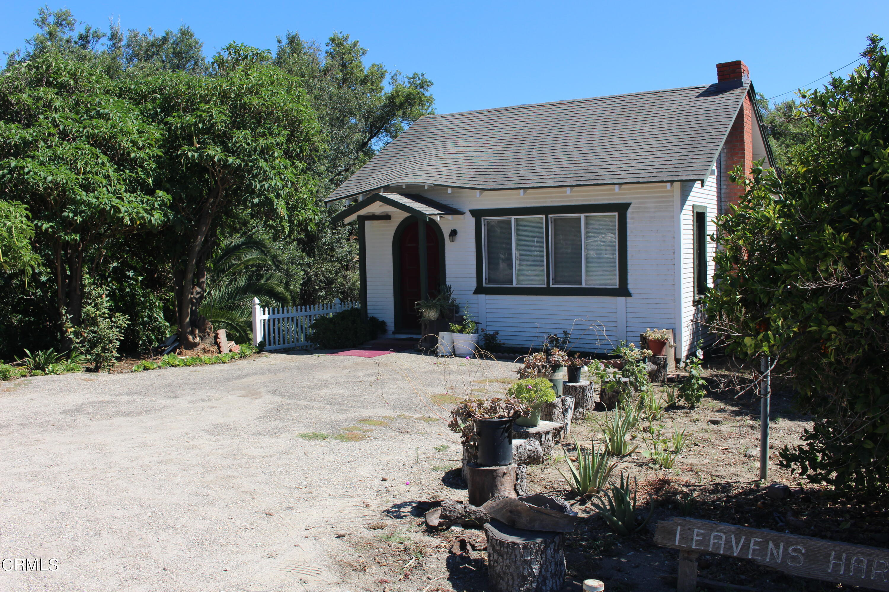 19086 East Telegraph Road Santa Paula, CA 93060 - Photo 10 of 26 a front view of a house with a yard