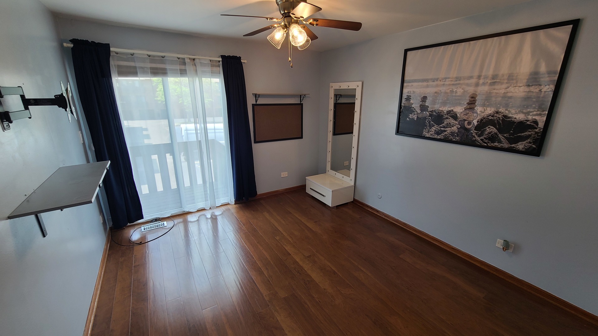 7548 Clarendon Hills Road, Unit 1B Willowbrook, IL 60527 - Photo 18 of 33 a view of a hallway with wooden floor and a livingroom view