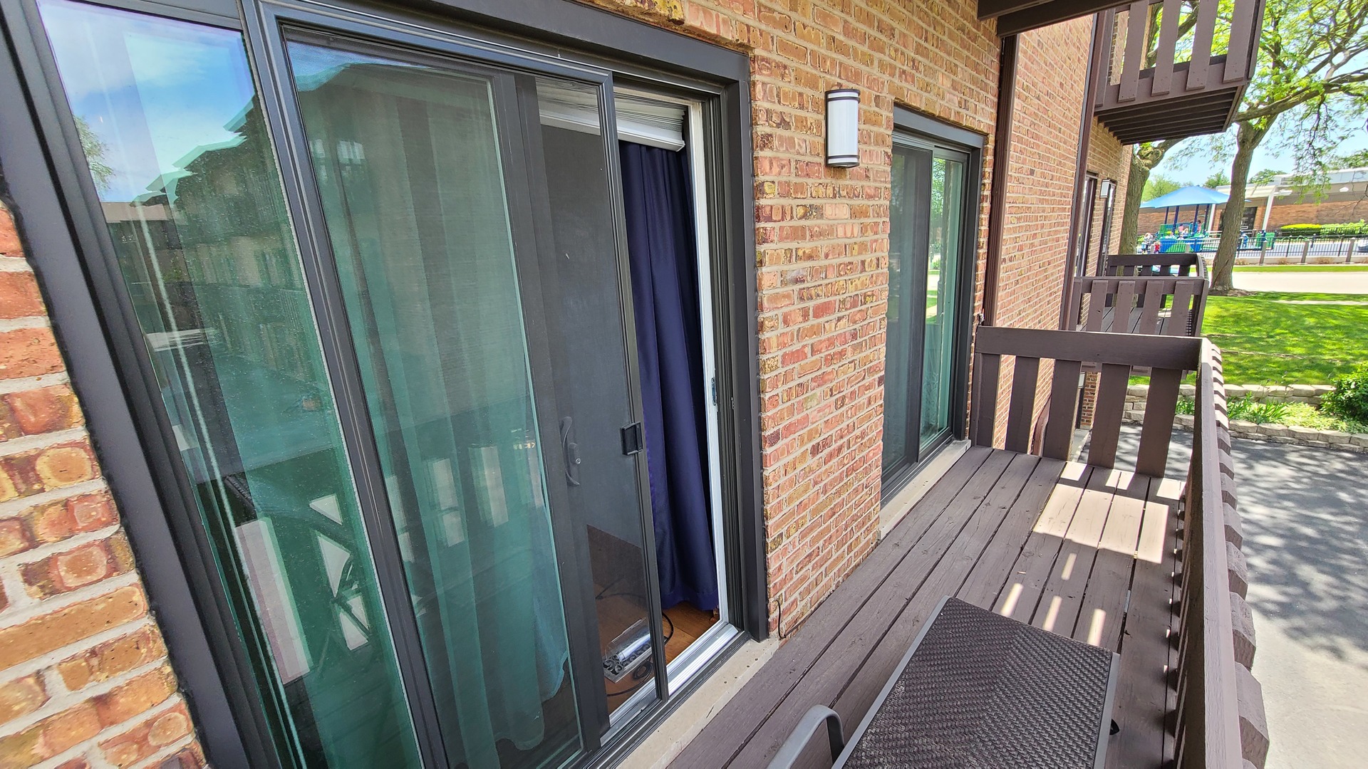 7548 Clarendon Hills Road, Unit 1B Willowbrook, IL 60527 - Photo 20 of 33 a view of balcony and wooden floor