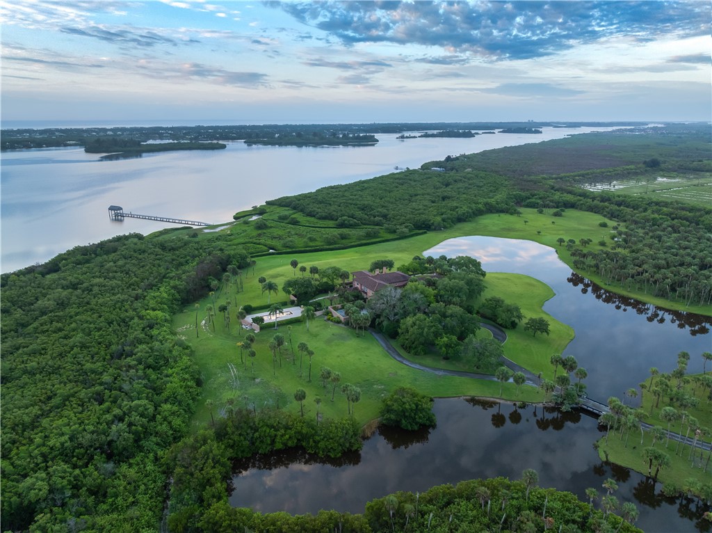 a view of a lake with a garden and lake view