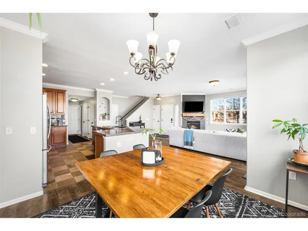 a view of a living room and kitchen