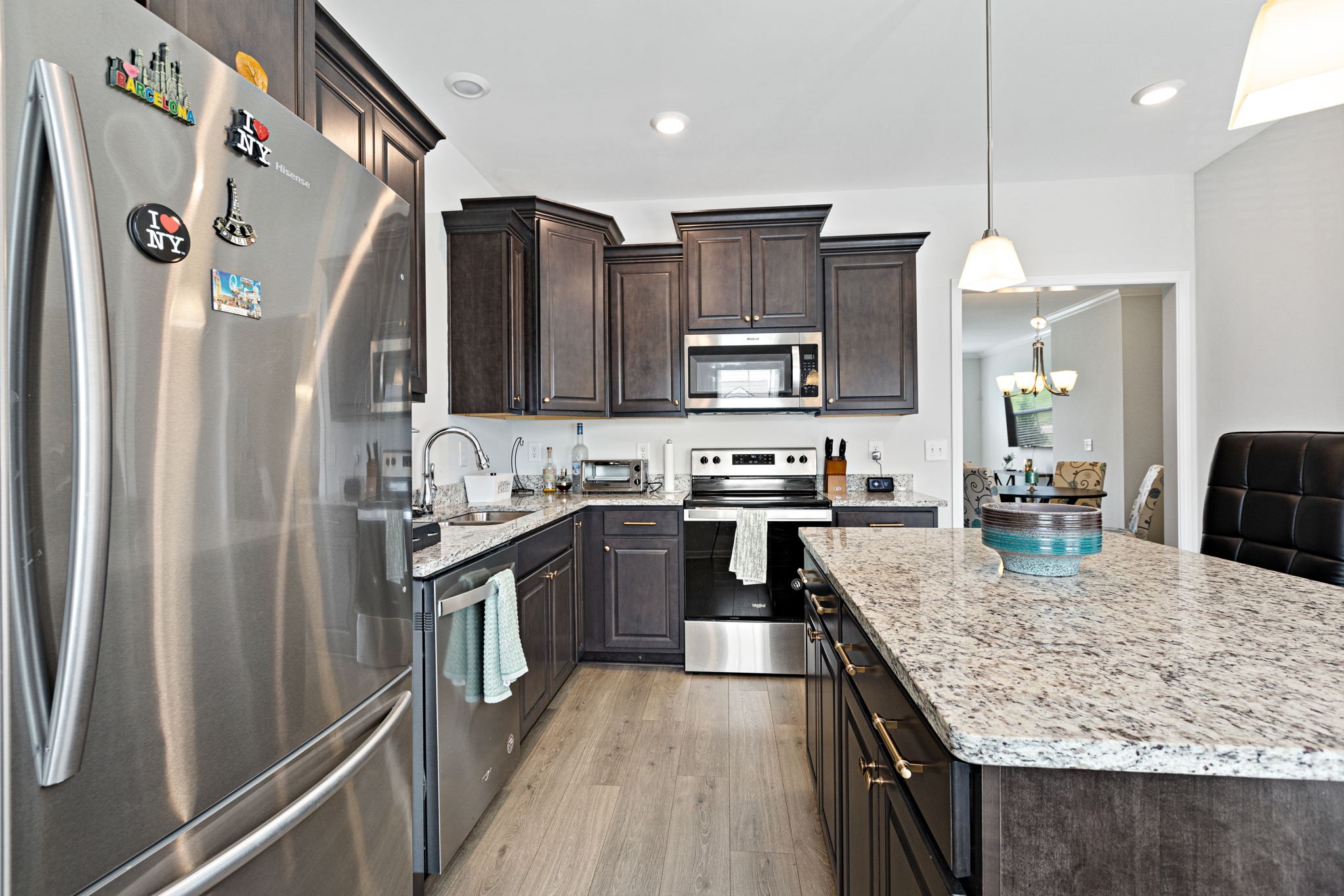 204 Kinsale Drive Spring Hill, TN 37174 - Photo 12 of 31 a kitchen with stainless steel appliances granite countertop a refrigerator a stove and a sink