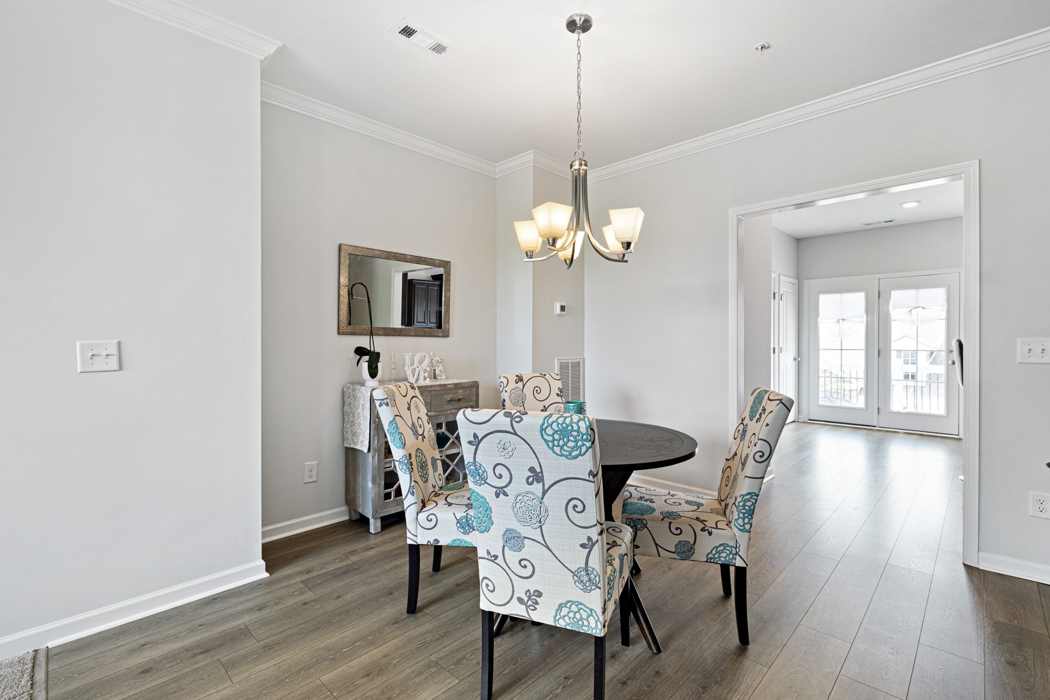 204 Kinsale Drive Spring Hill, TN 37174 - Photo 13 of 31 a view of a dining room with furniture and wooden floor