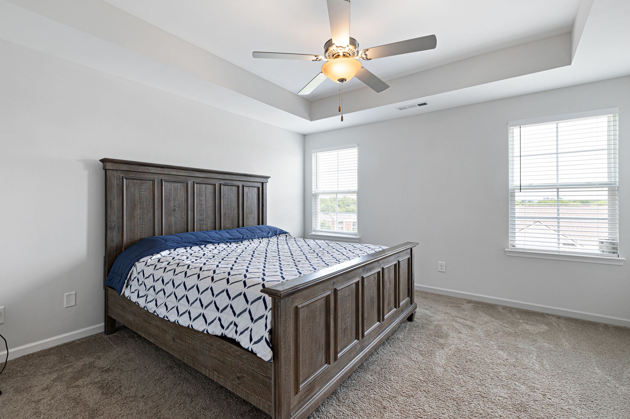 204 Kinsale Drive Spring Hill, TN 37174 - Photo 16 of 31 a bed sitting in a bedroom next to a window