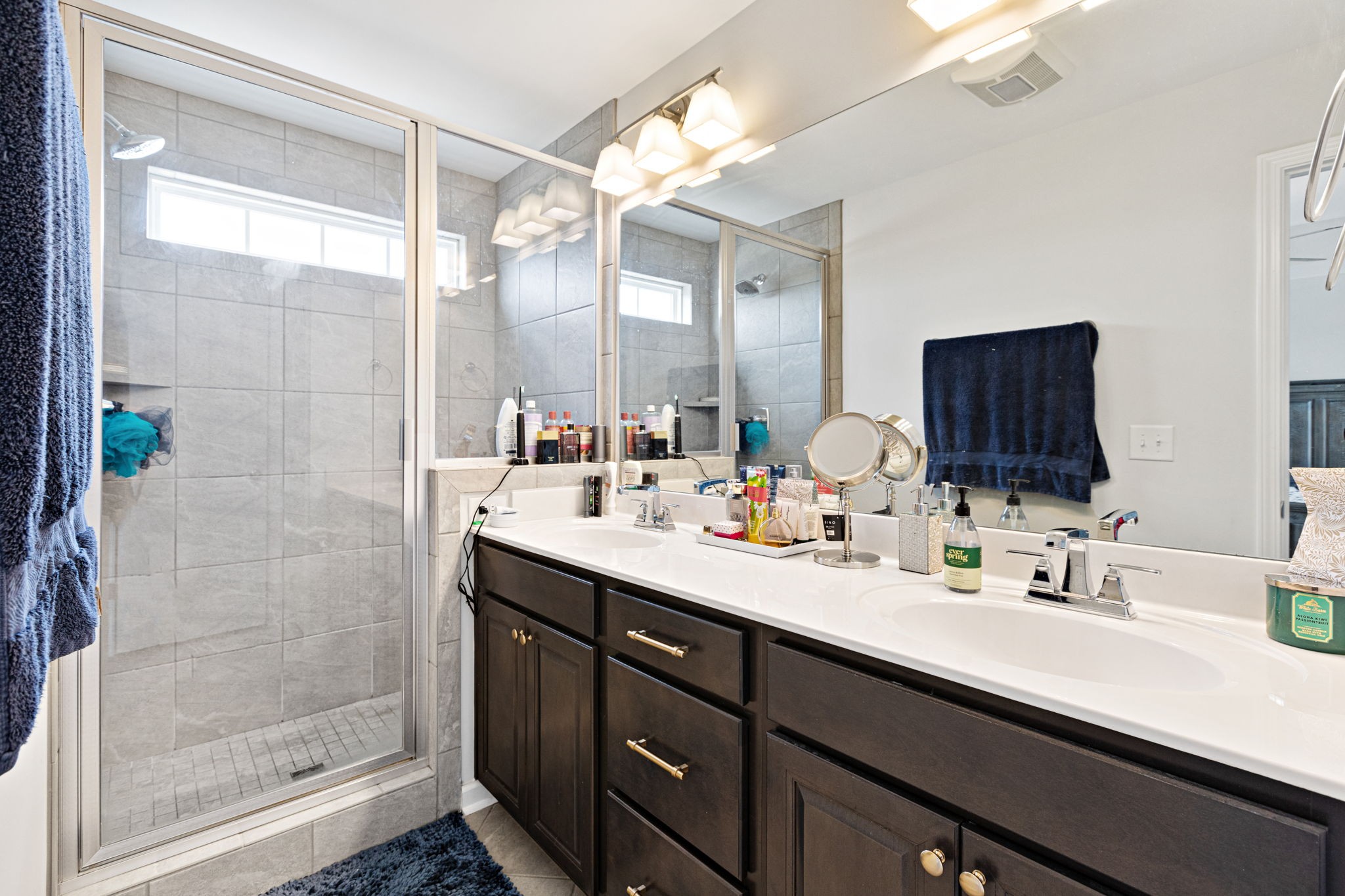 204 Kinsale Drive Spring Hill, TN 37174 - Photo 18 of 31 a bathroom with a double vanity sink mirror and shower