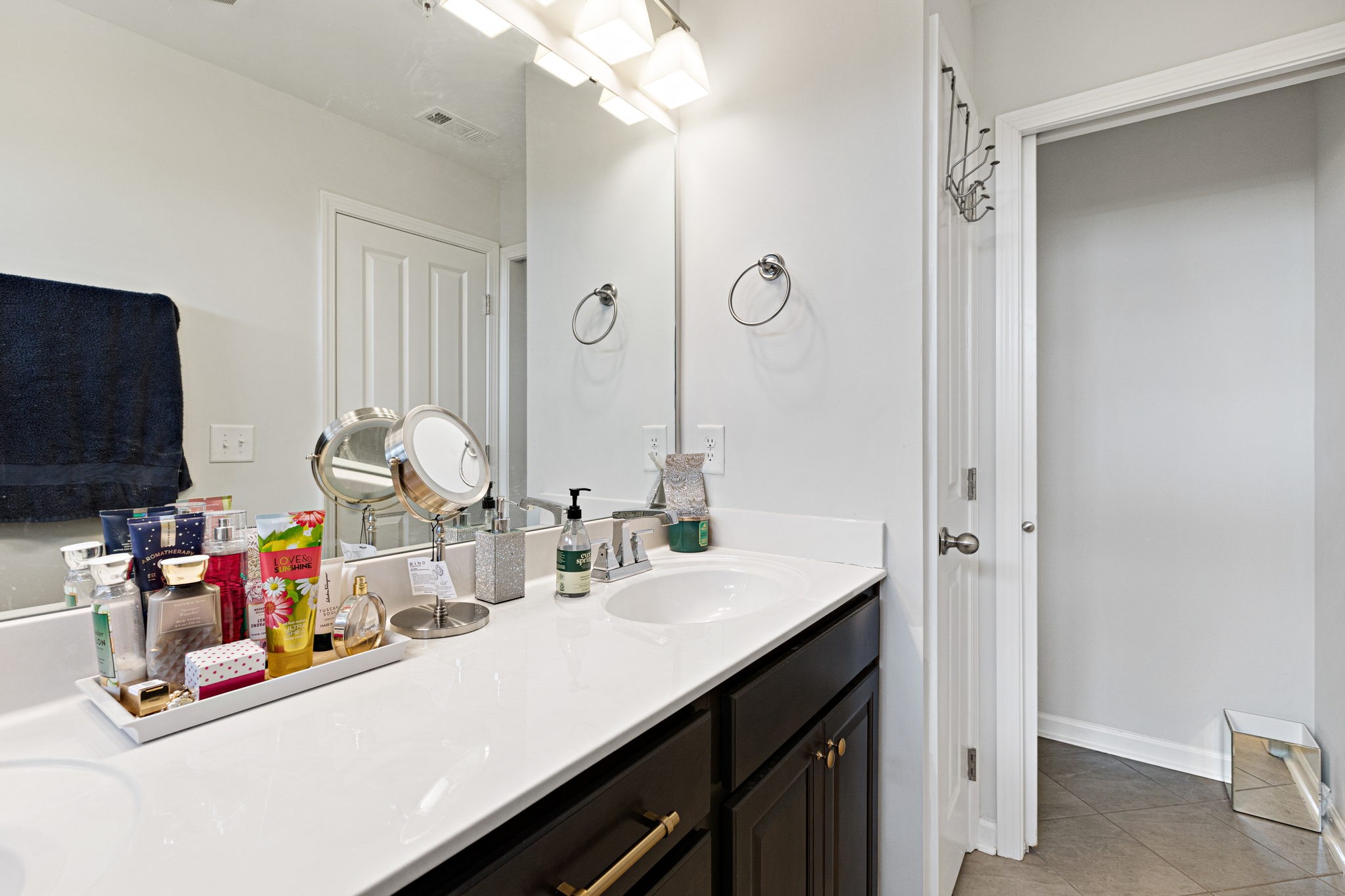204 Kinsale Drive Spring Hill, TN 37174 - Photo 19 of 31 a bathroom with sink and a mirror