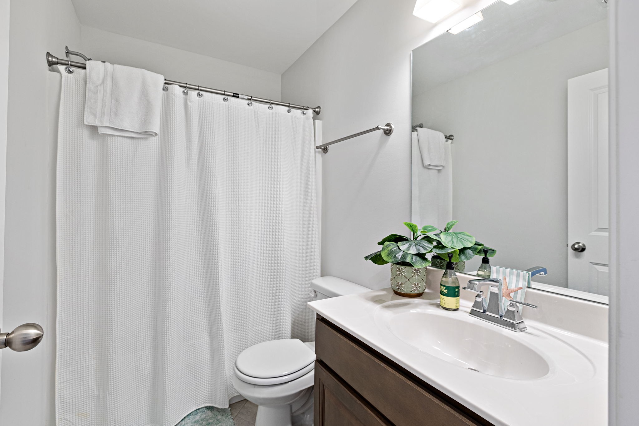 204 Kinsale Drive Spring Hill, TN 37174 - Photo 20 of 31 a bathroom with a sink toilet and shower
