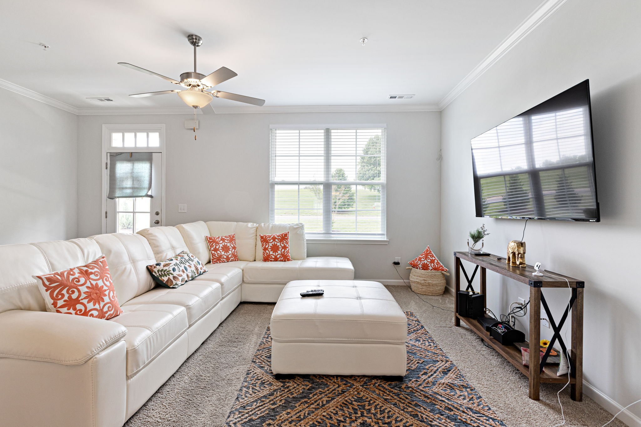 204 Kinsale Drive Spring Hill, TN 37174 - Photo 7 of 31 a living room with furniture and a flat screen tv
