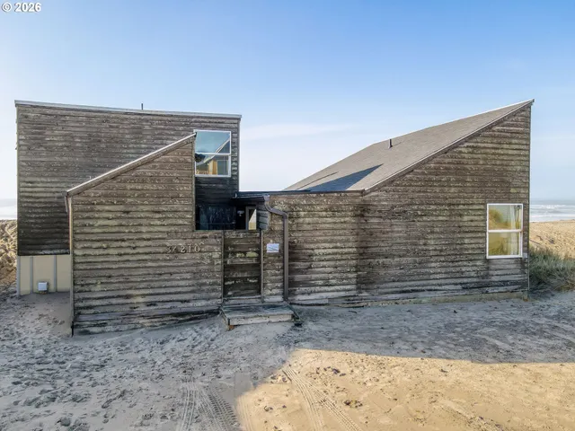 a view of a brick house with an empty space