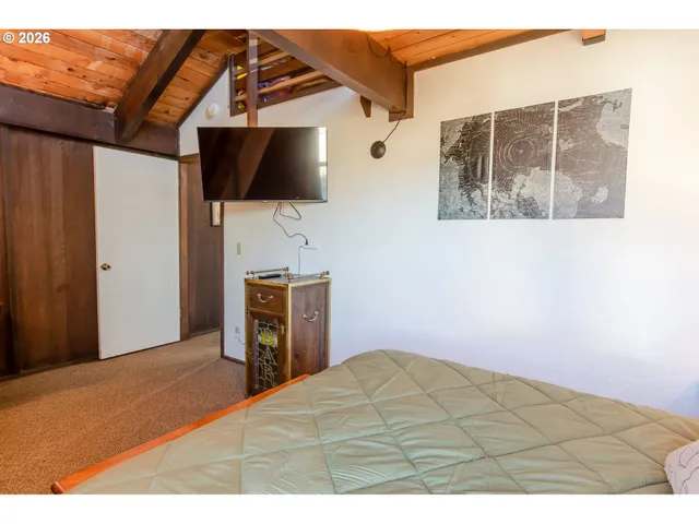 a view of a chairs and table on the wooden floor
