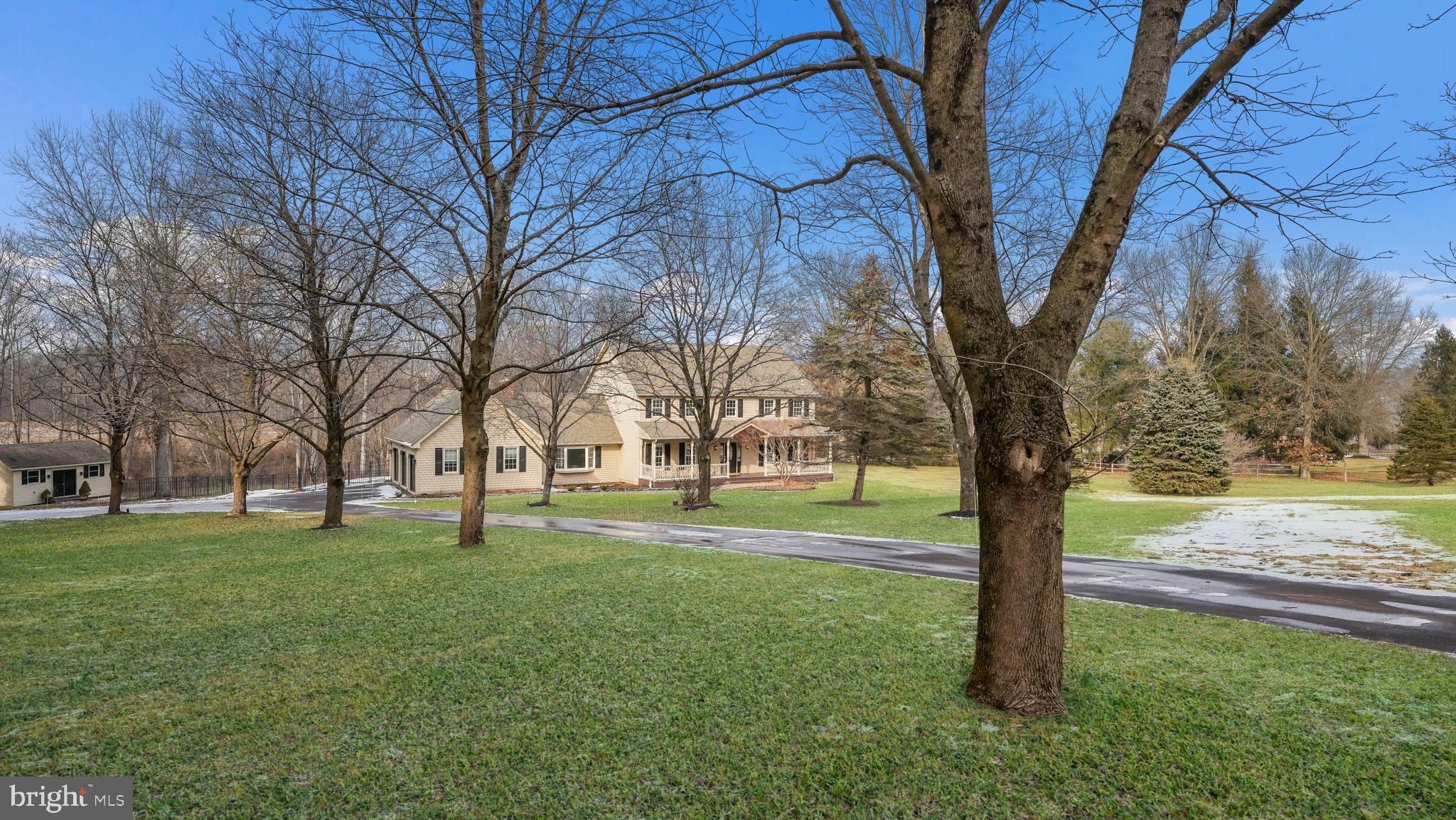 2520 Valley Road Jamison, PA 18929 - Photo 3 of 40 a big yard with flowing stream of water in front of it