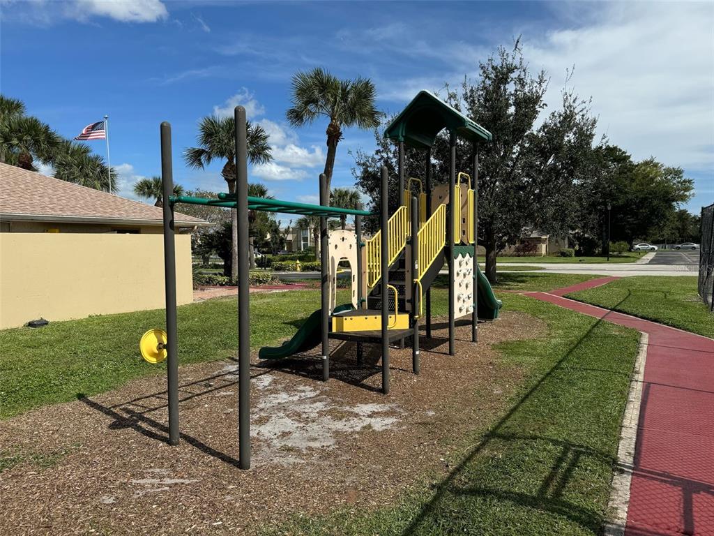 1030 Abada Court Northeast, Unit 110 Palm Bay, FL 32905 - Photo 10 of 10 an aerial view of a park