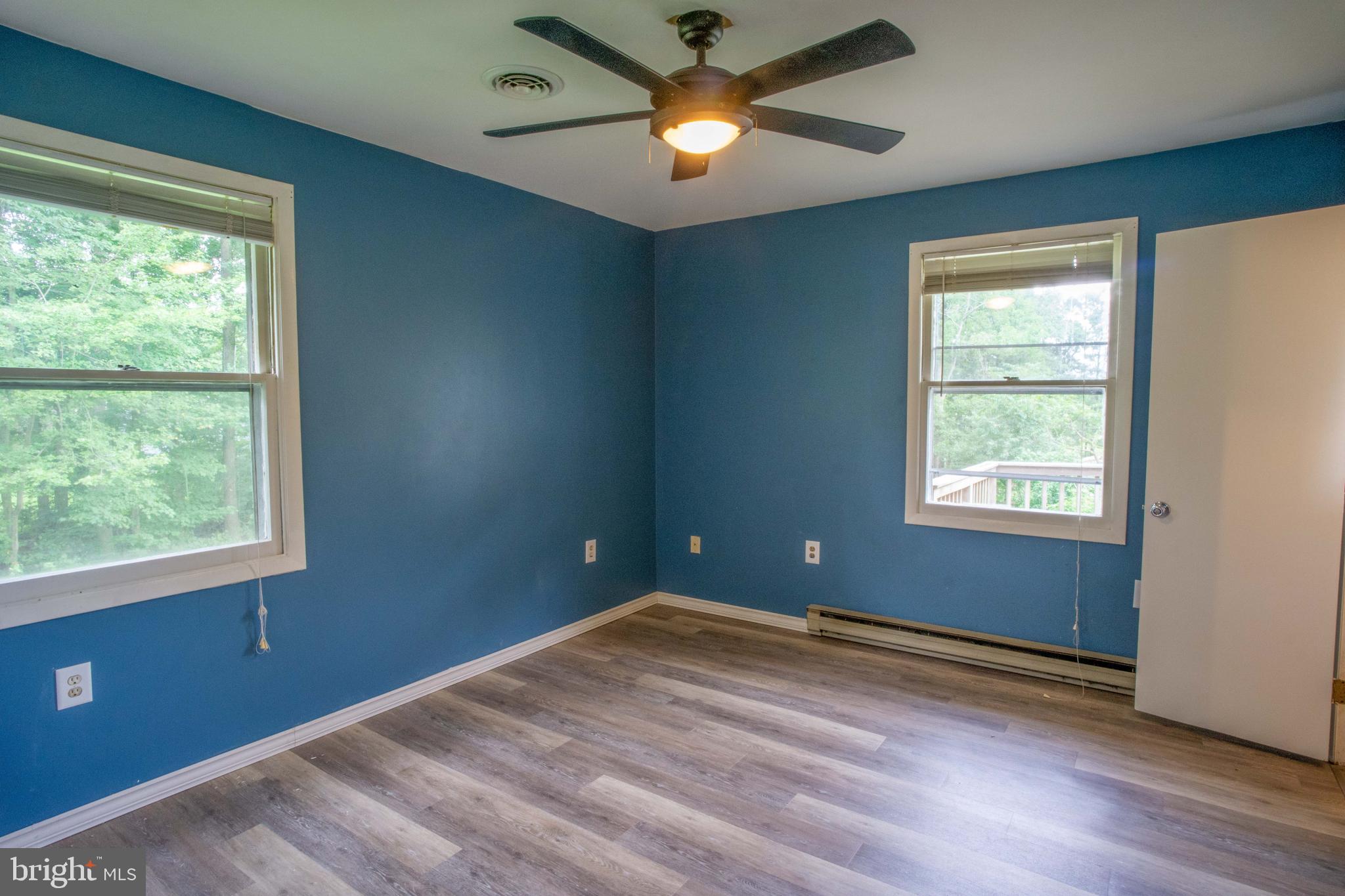 445 Marley Road Elkton, MD 21921 - Photo 13 of 34 Primary Bedroom with striking Laminate Flooring