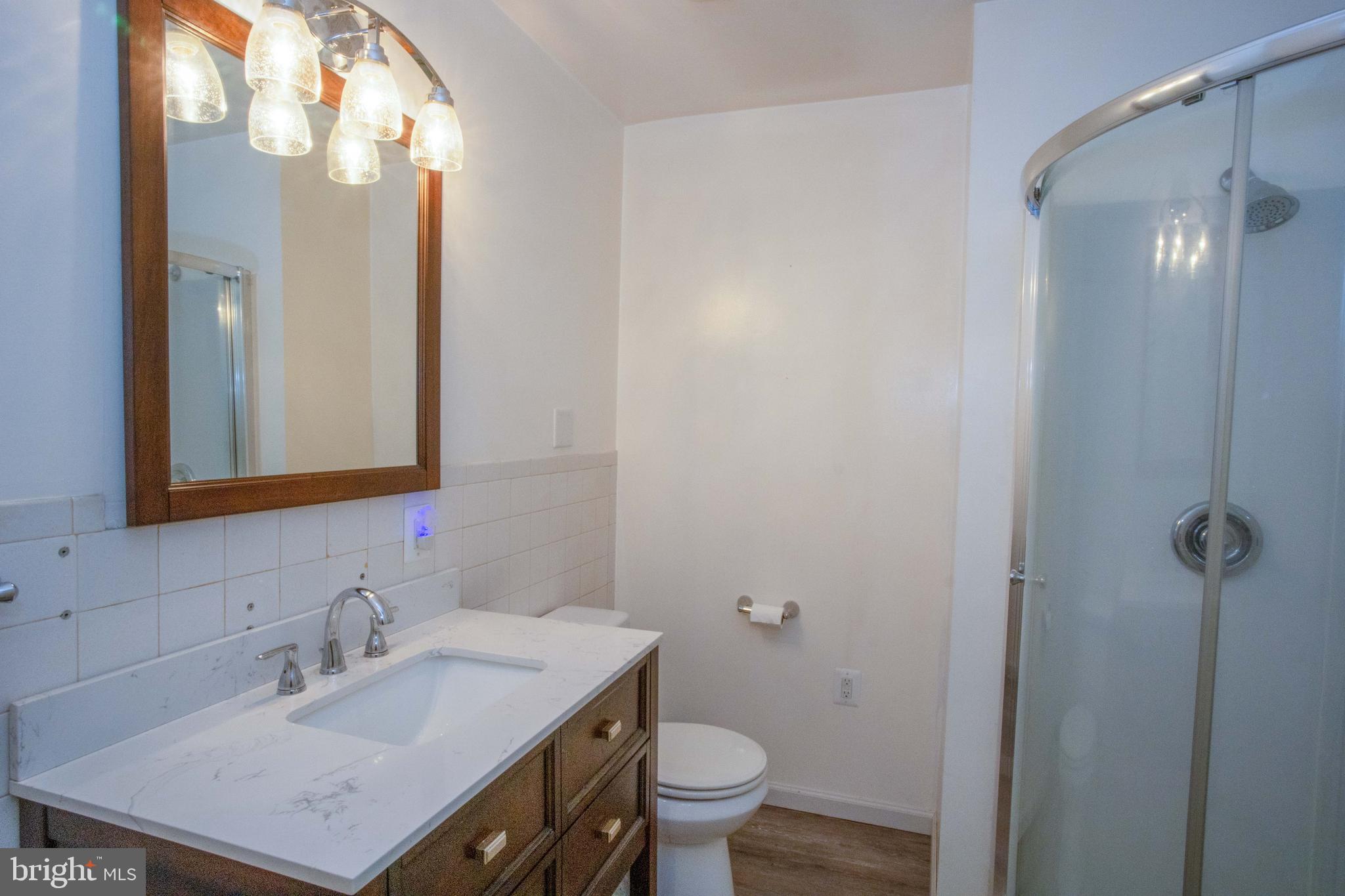 445 Marley Road Elkton, MD 21921 - Photo 15 of 34 Primary Bath with Laminate Flooring