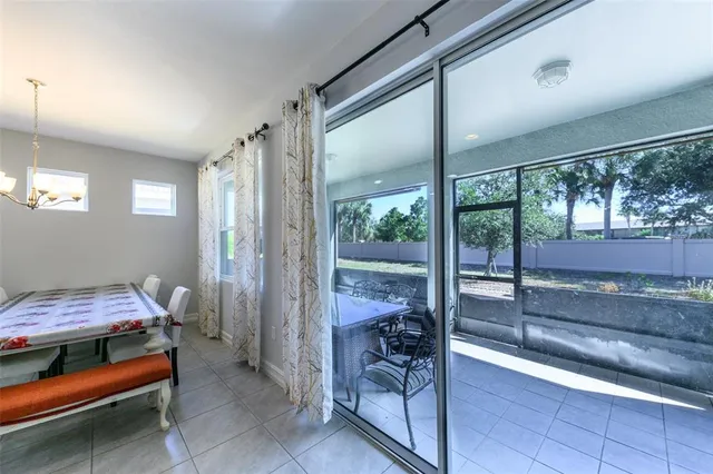 a spacious bedroom with a bed and a window