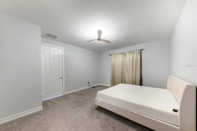 a view of a bathroom from a hallway