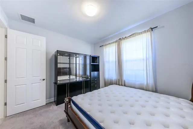 a bathroom with a bathtub a toilet and a shower