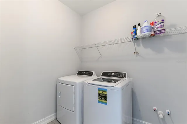 a view of livingroom with hardwood floor and a ceiling fan
