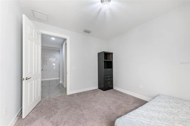 a living room with large windows