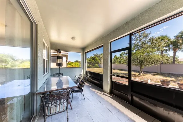 a room with furniture and a flat screen tv